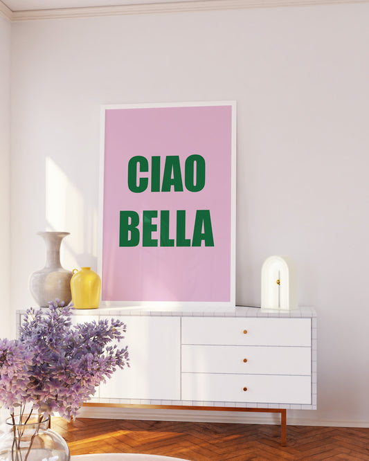 Contemporary quote print featuring the words ciao bella in green font on a pink background